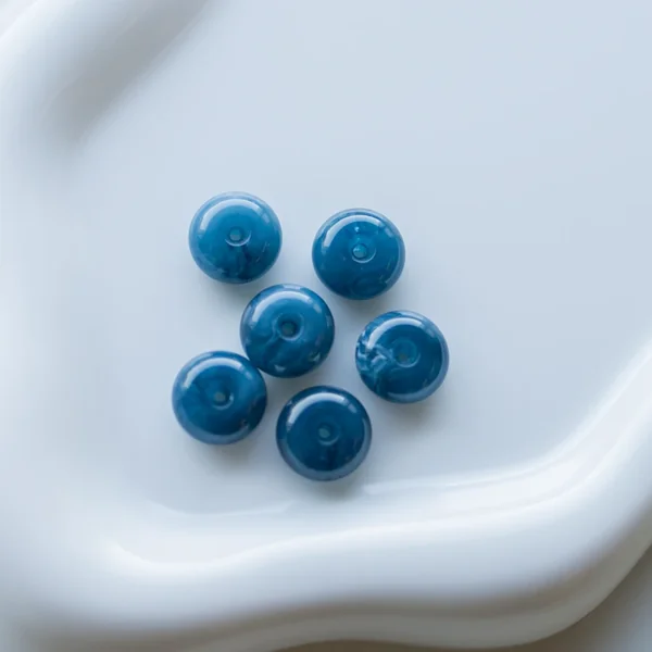 Perles rondelles 12x7 mm en résine opaque - Bleu pétrole marbré x6